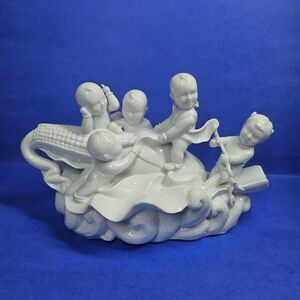 Maitland-Smith Figurine Children Riding Ear of Corn White Porcelain Blanc Chine